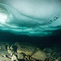 ice at swiss lake in June